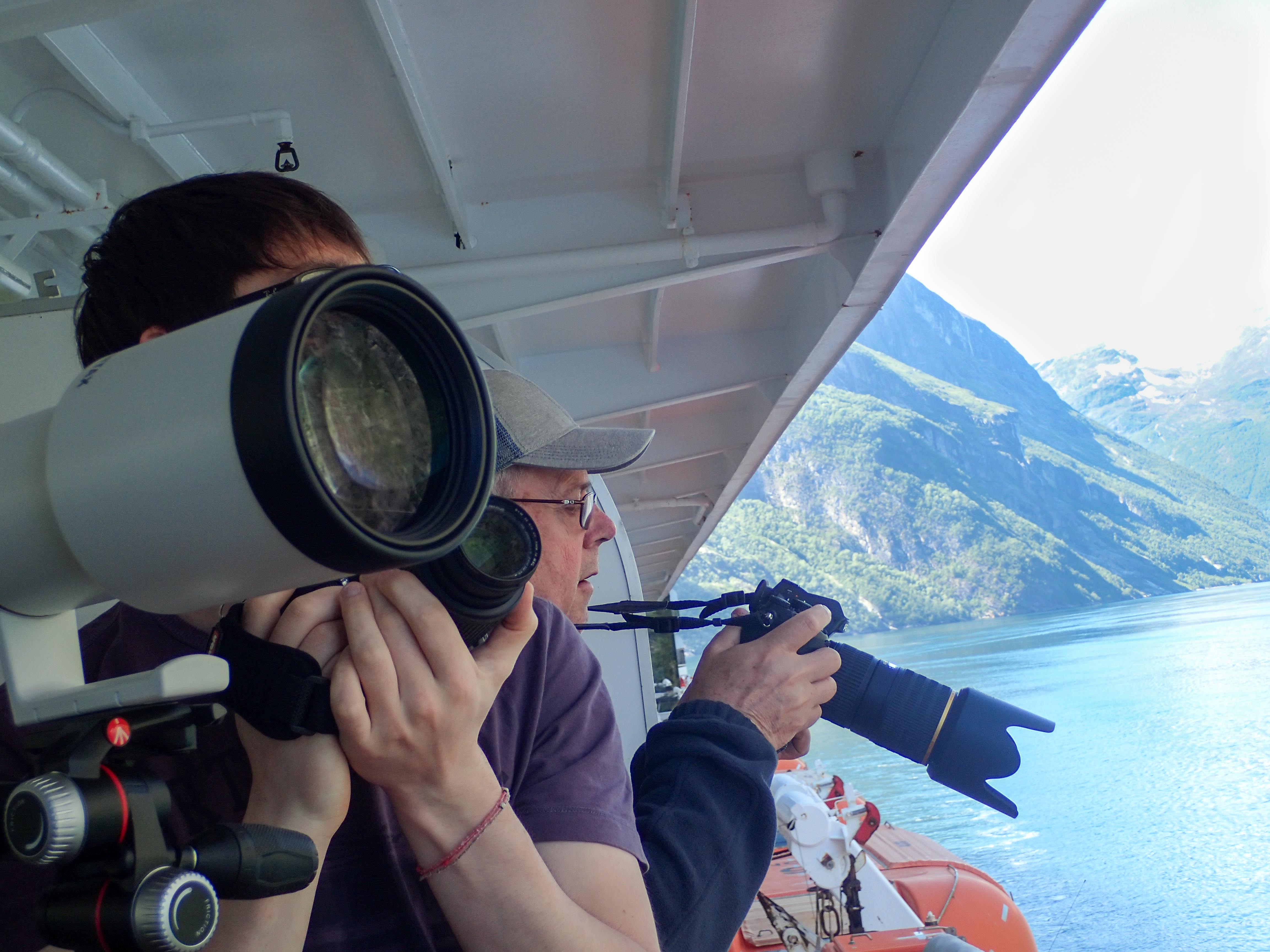 Photography with intent on a cruise ship balcony sailing the Norwegian Fjords. Photo by Wendy